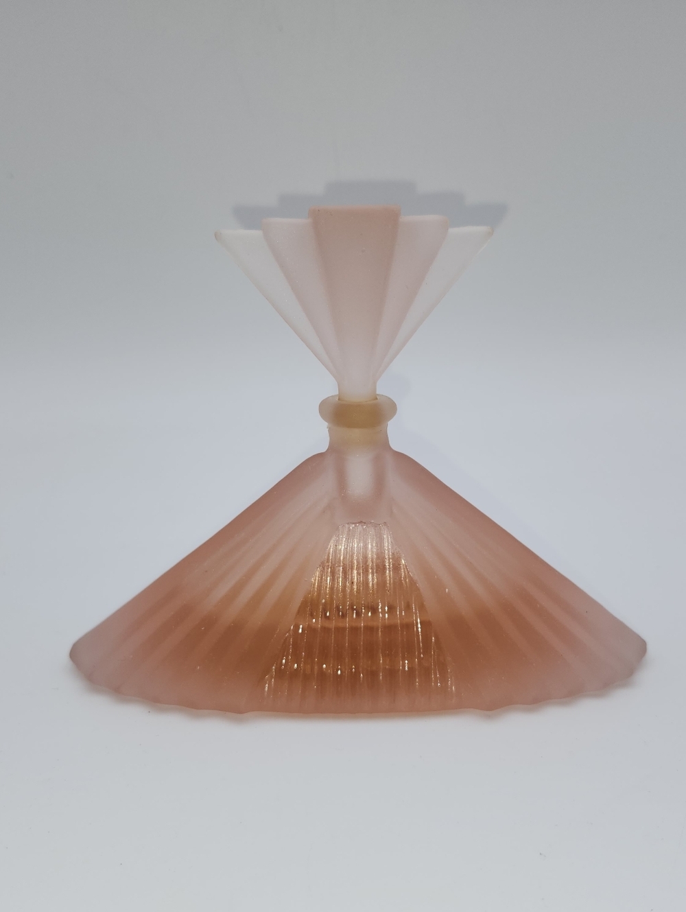 vintage Art Deco-style pink frosted glass pyramid fan perfume bottle,